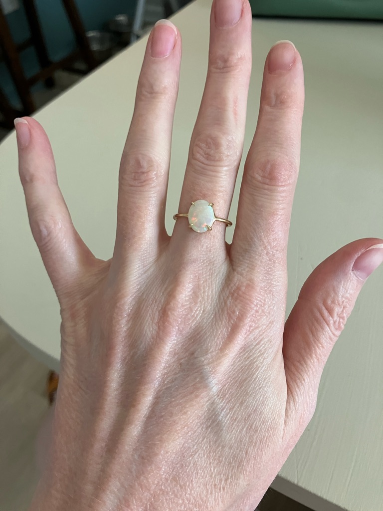 Gold Opal Oval Solitaire Ring  White Opal
